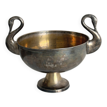 Large champagne bucket with patinated metal swan handles.