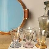 Aperitif liqueur service in iridescent glass on tray