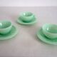 10 almond green opaline cups and saucers from the 50s