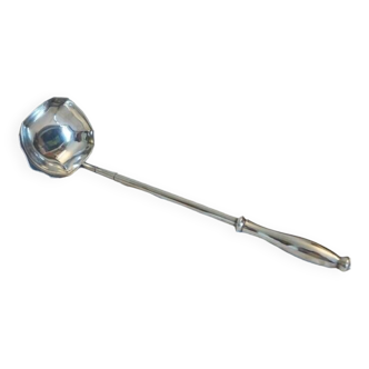 Silver metal sauce or cream ladle