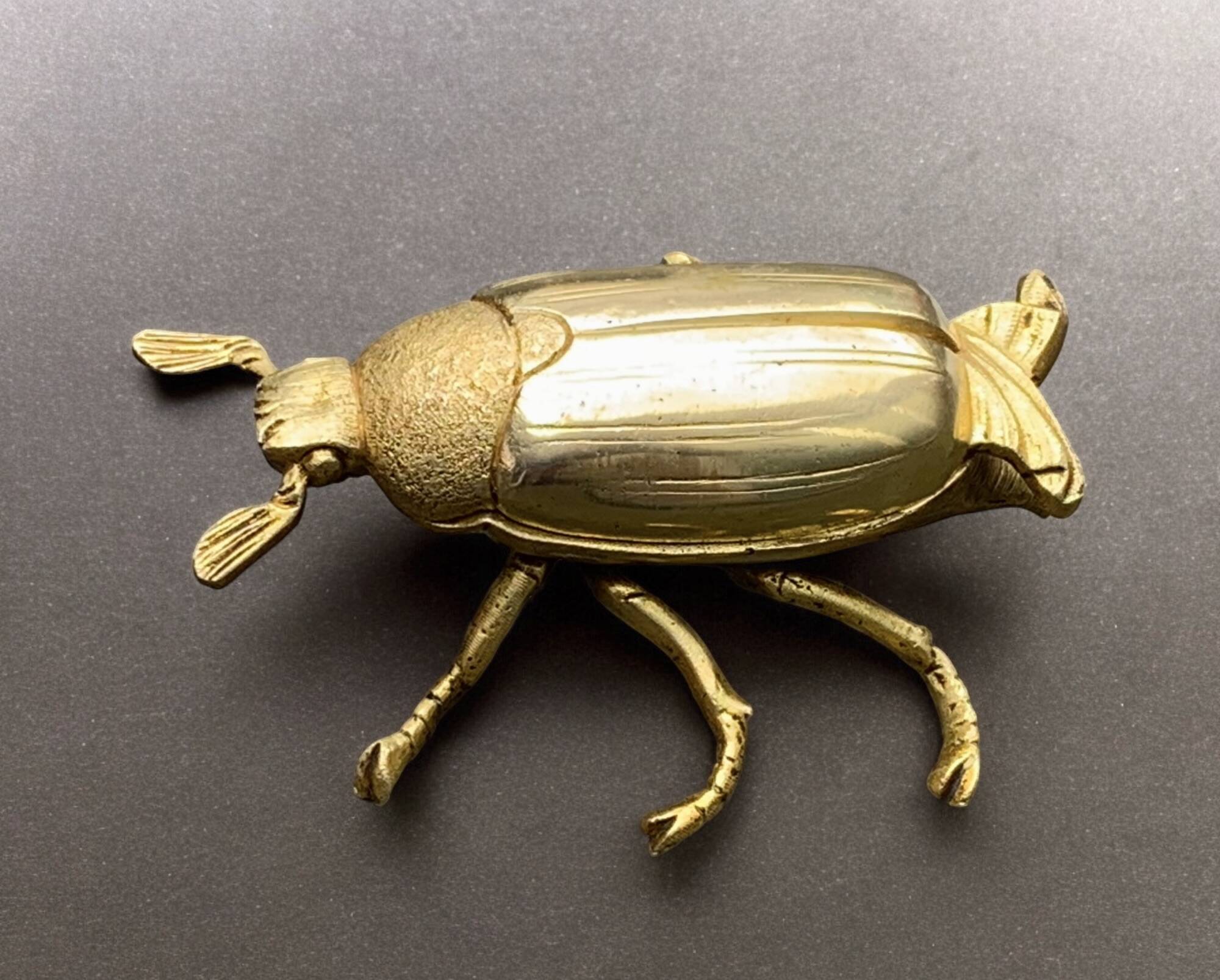 Vintage golden brass scarab