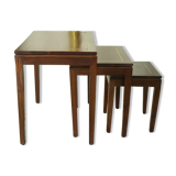 Pull-out tables in mahogany and vintage brass