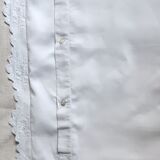 pillowcase embroidered with flowers and monogrammed festoons LK