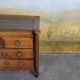 Small 18th-century chest of drawers in walnut and cherry wood.
