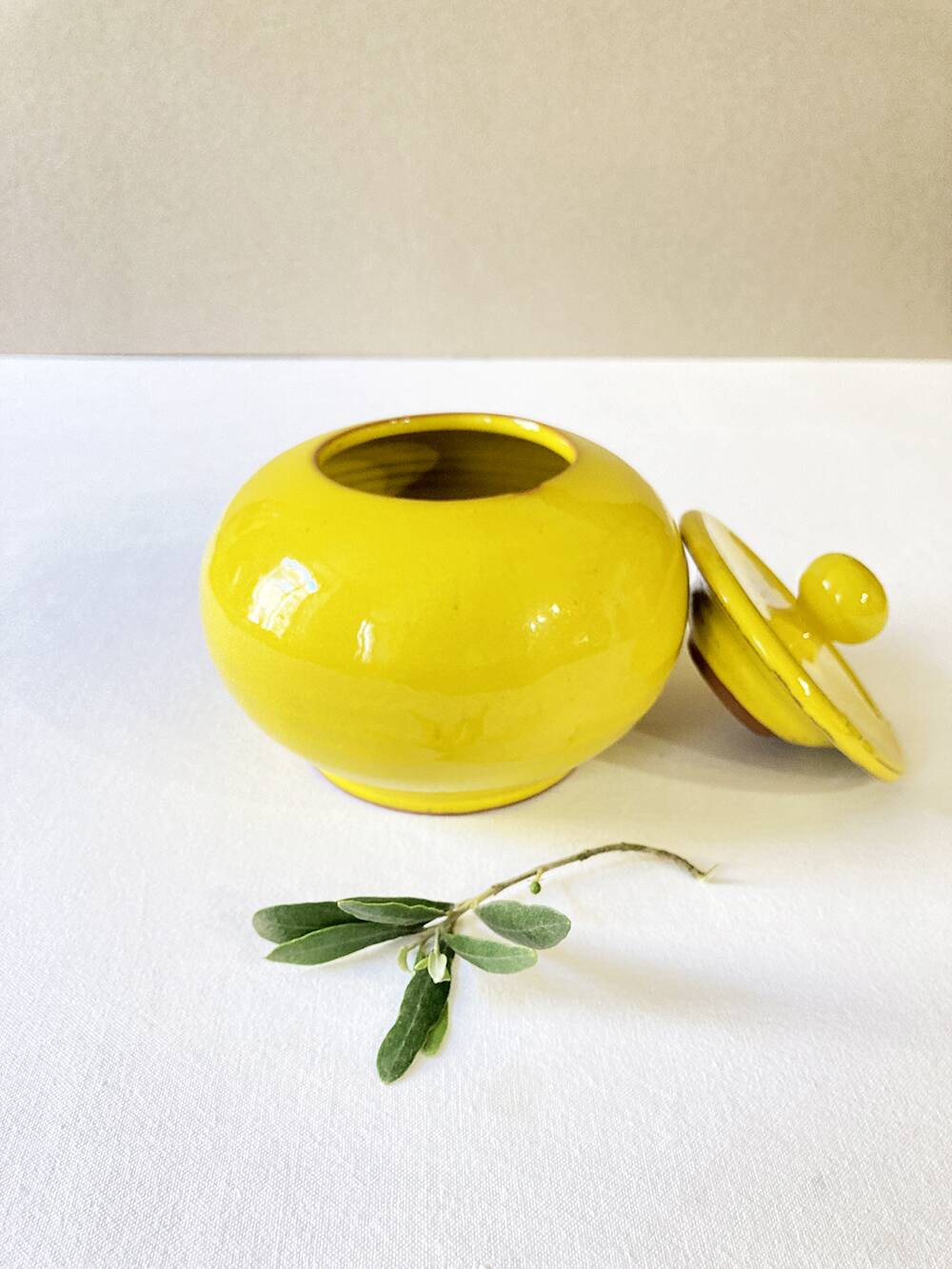 Yellow glazed ceramic sugar bowl