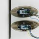 Pair of smoked glass and chrome wall lights from the 1970s.