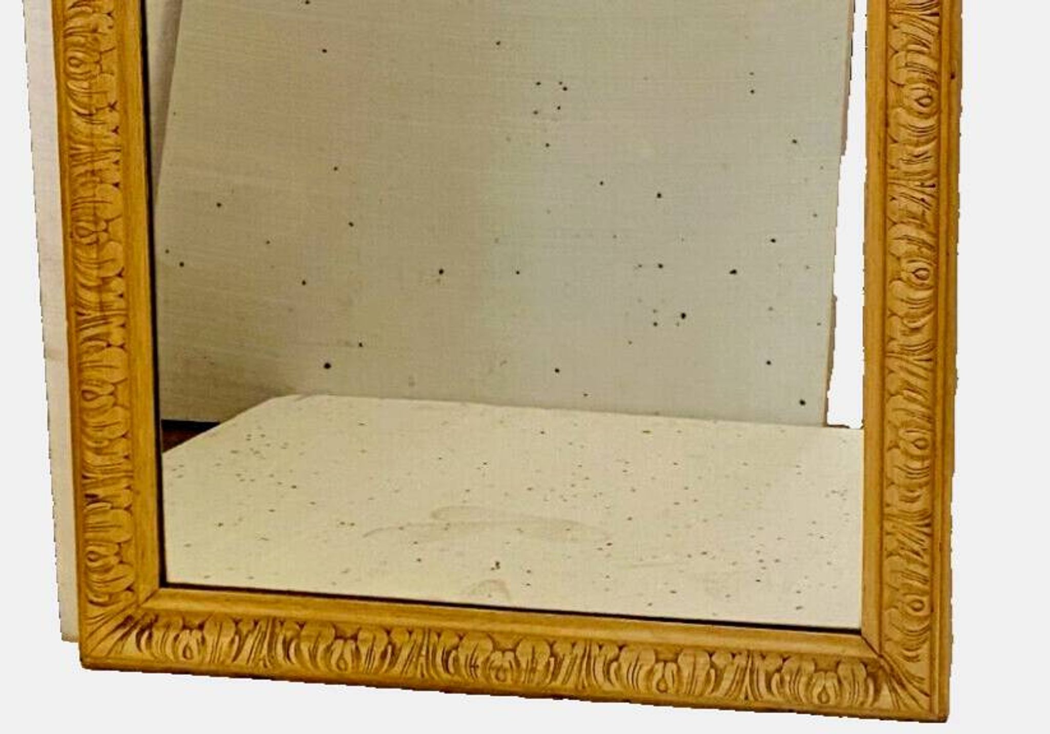 Louis Philippe mirror in wood and patinated stucco, 19th century.