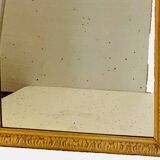 Louis Philippe mirror in wood and patinated stucco 19th century