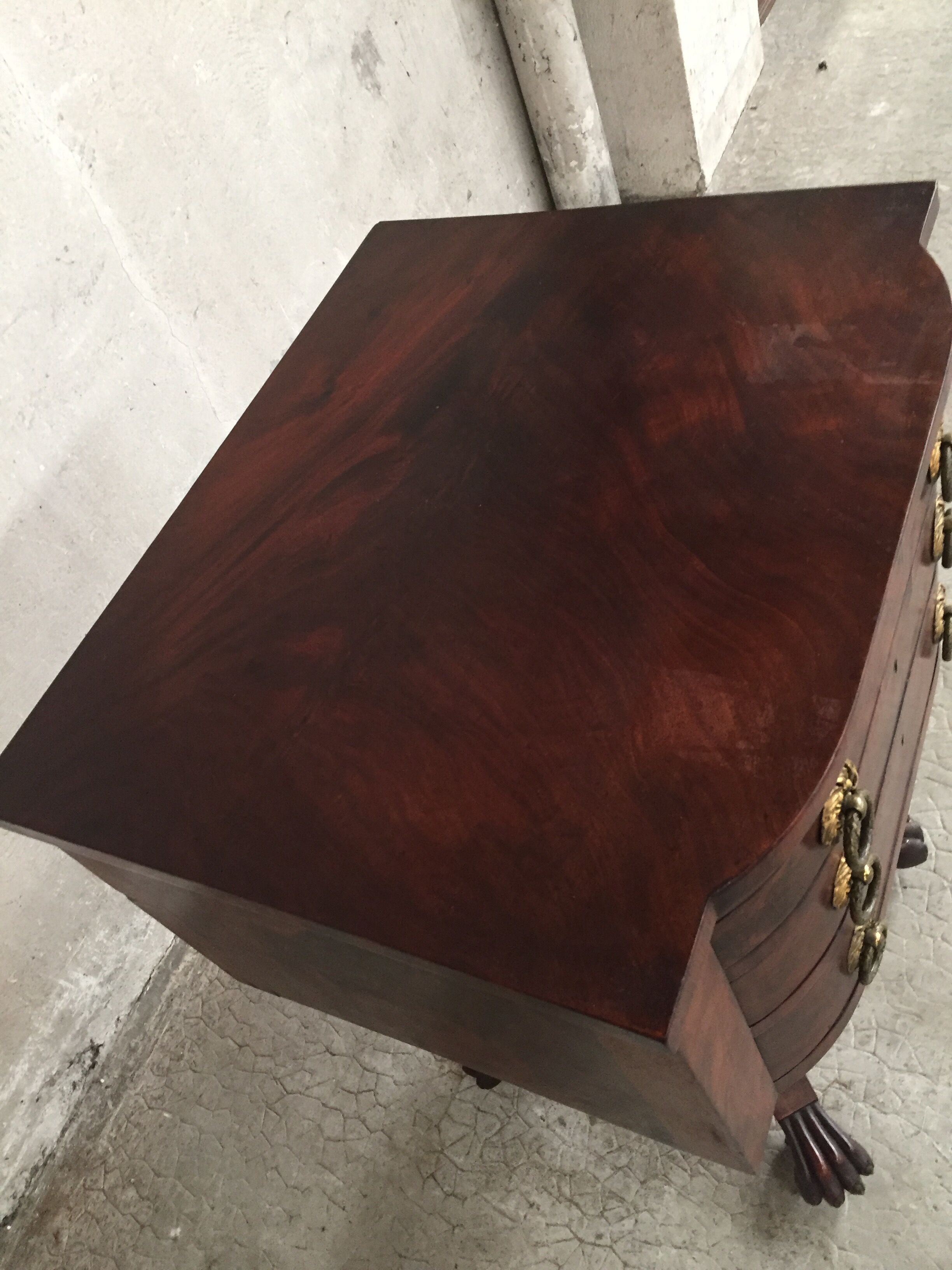 Small piece of english furniture has 3 drawers in mahogany for silverware
