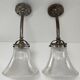 Pair of bronze and glass sconces  1900
