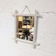 Miroir ancien à cadre bois, montage à croisillons