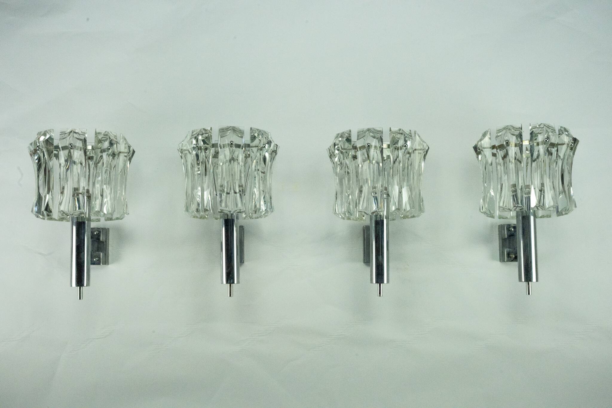 Set of four large Murano glass elements and chromed brass sconces, Italy 60