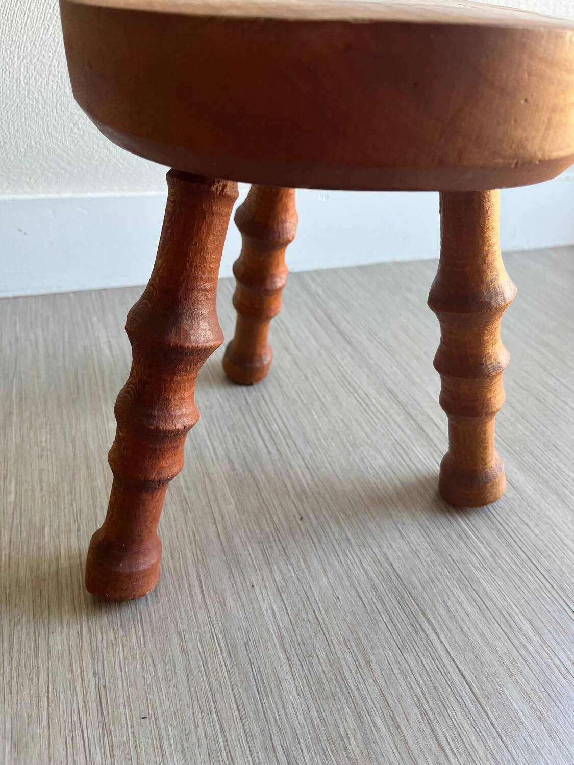 Wooden tripod stool