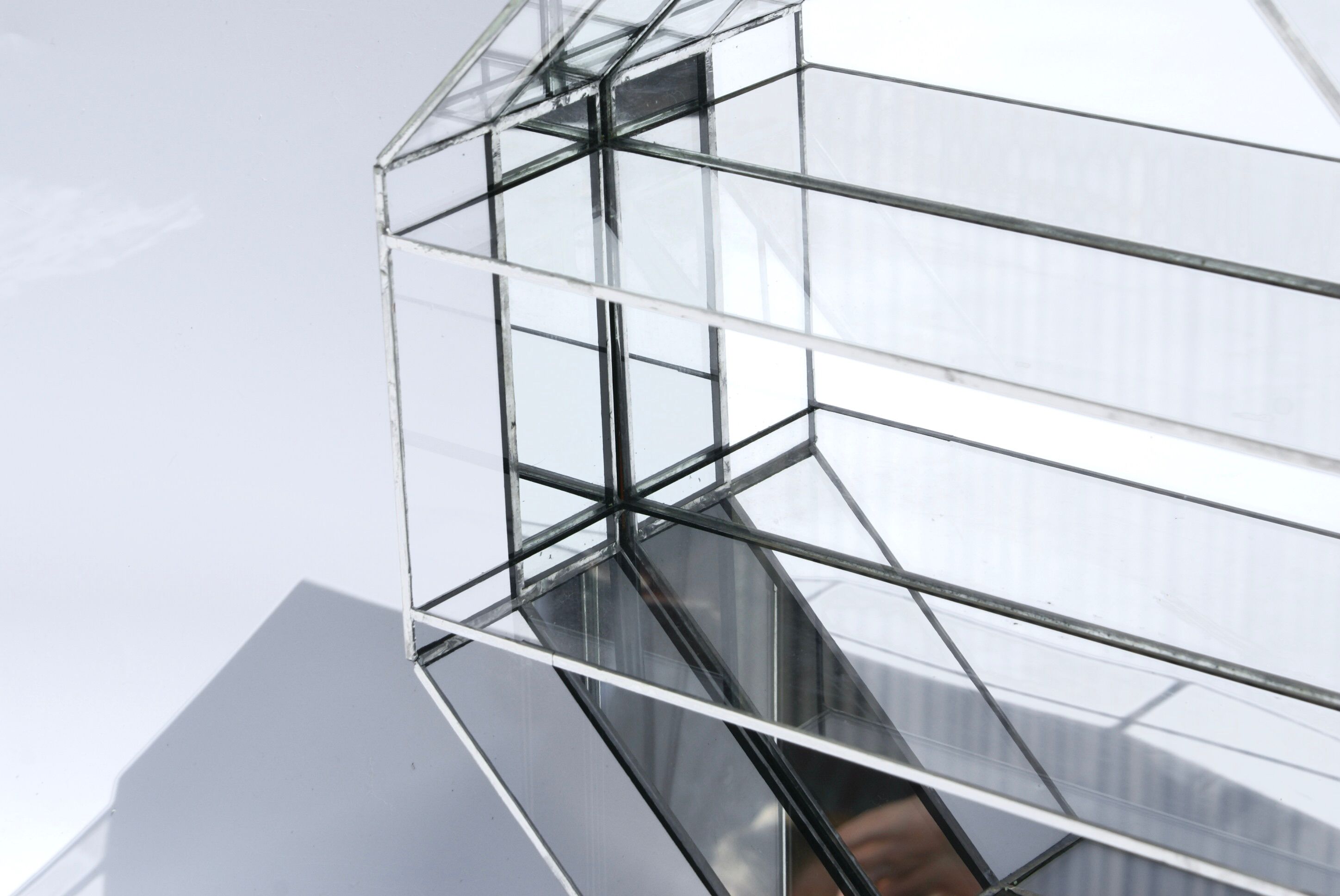 Handcrafted mirrored shelving cabinet