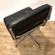 Intermediate Eames chair from the 70s in leather.