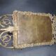Repousse brass wall mirror with three candles, beveled glass, end of 19th century, double eagles