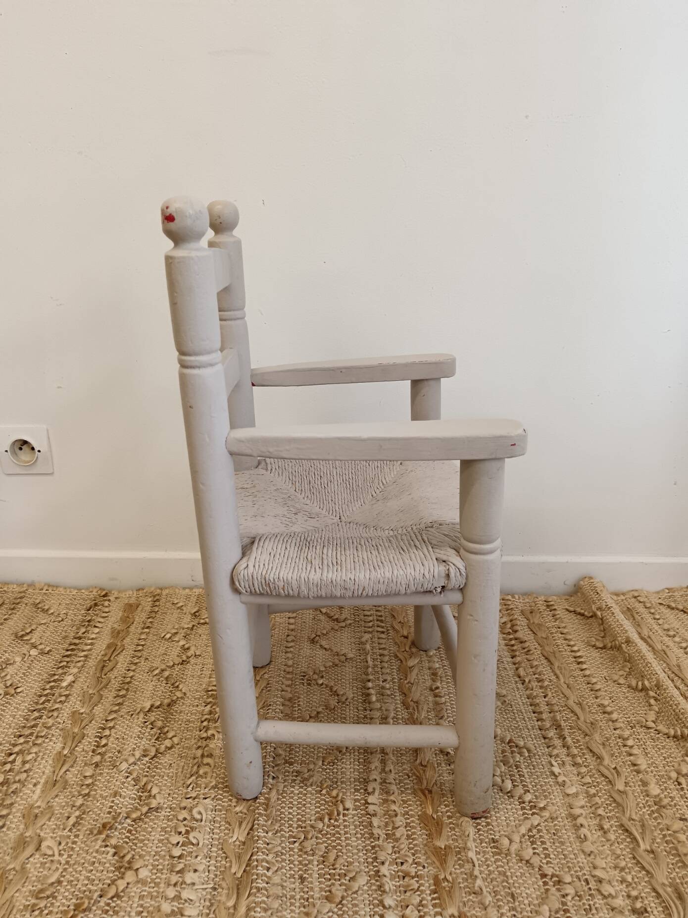 Grey patinated children's armchair with straw seat