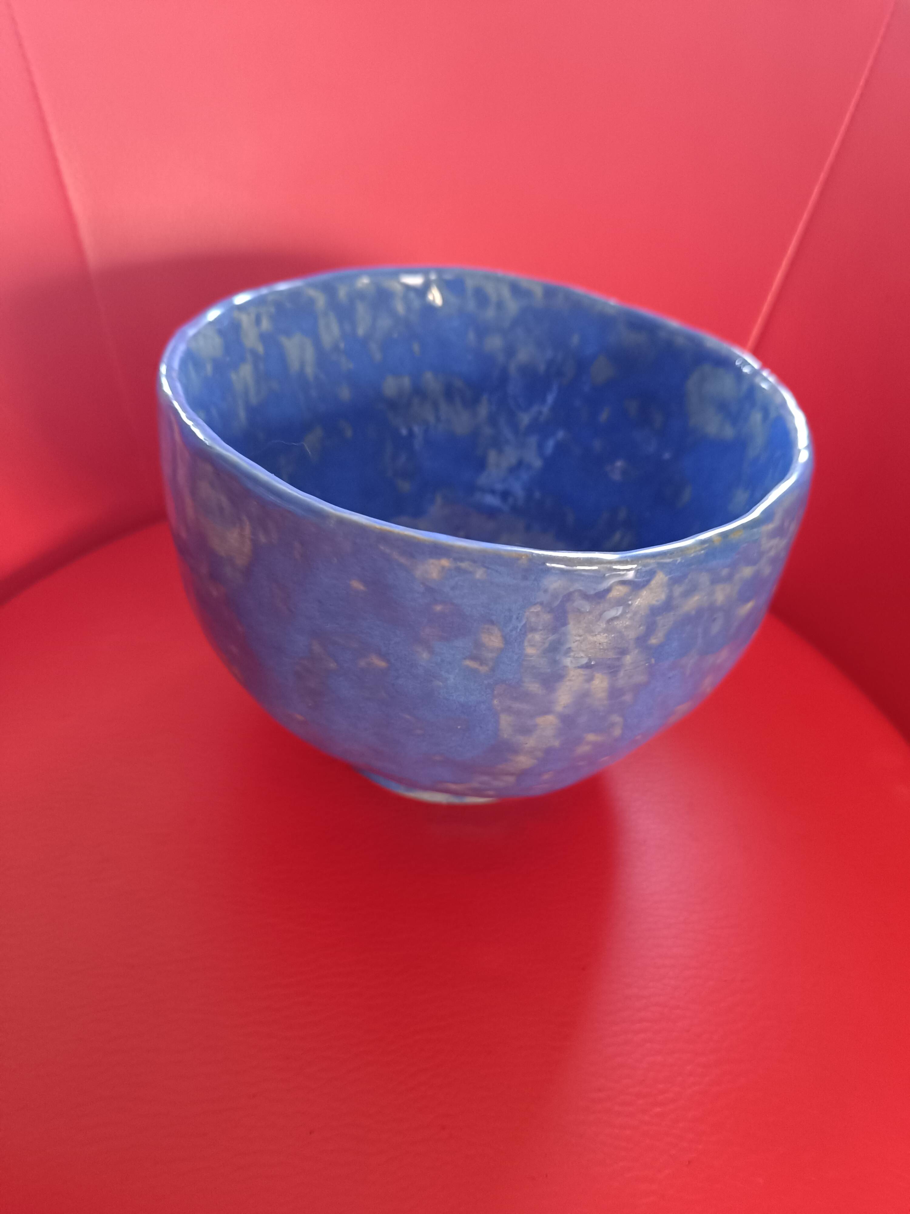 Large blue glazed stoneware bowl.
