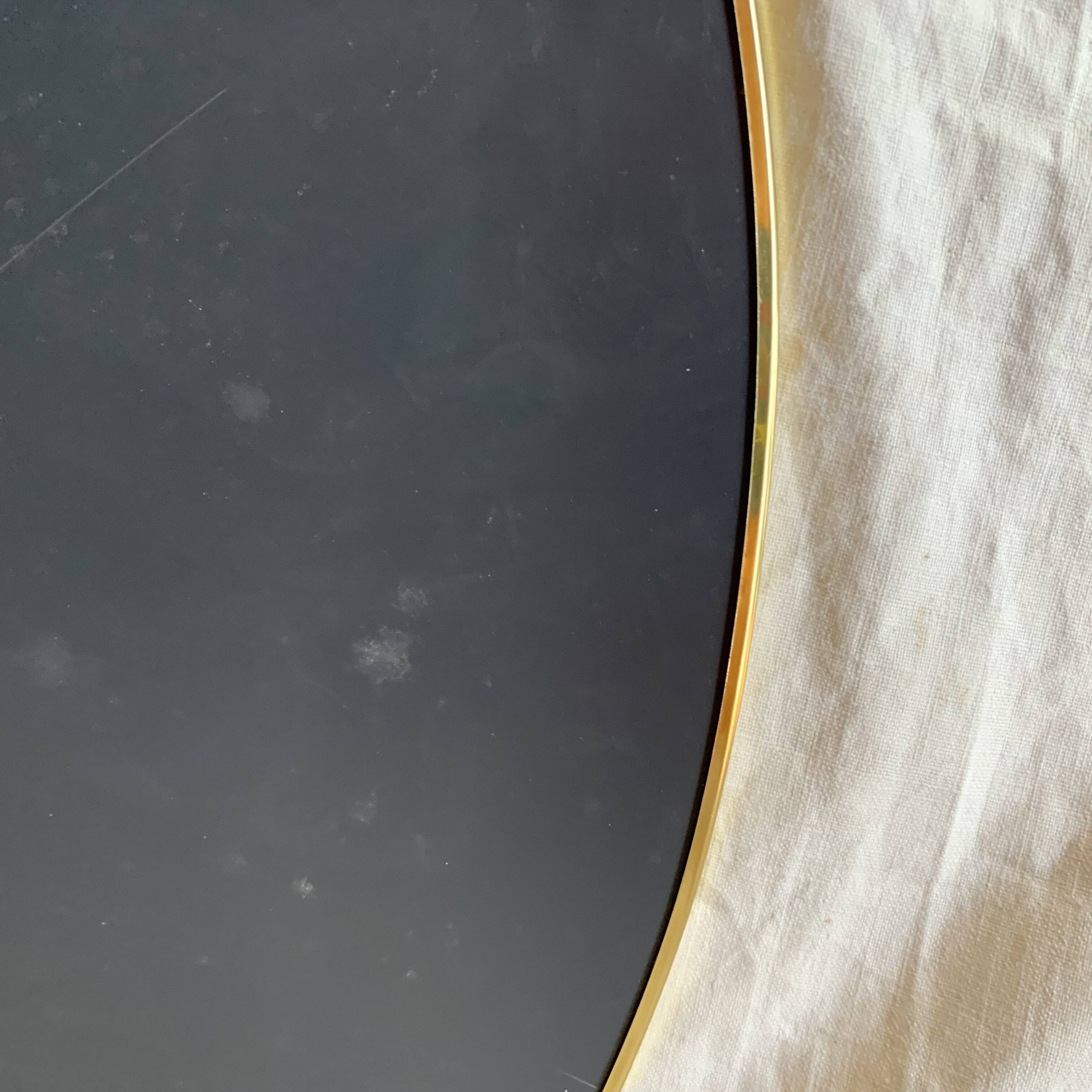 Round mirror with brass rim - 55 cm
