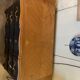 Black and wood chest of drawers