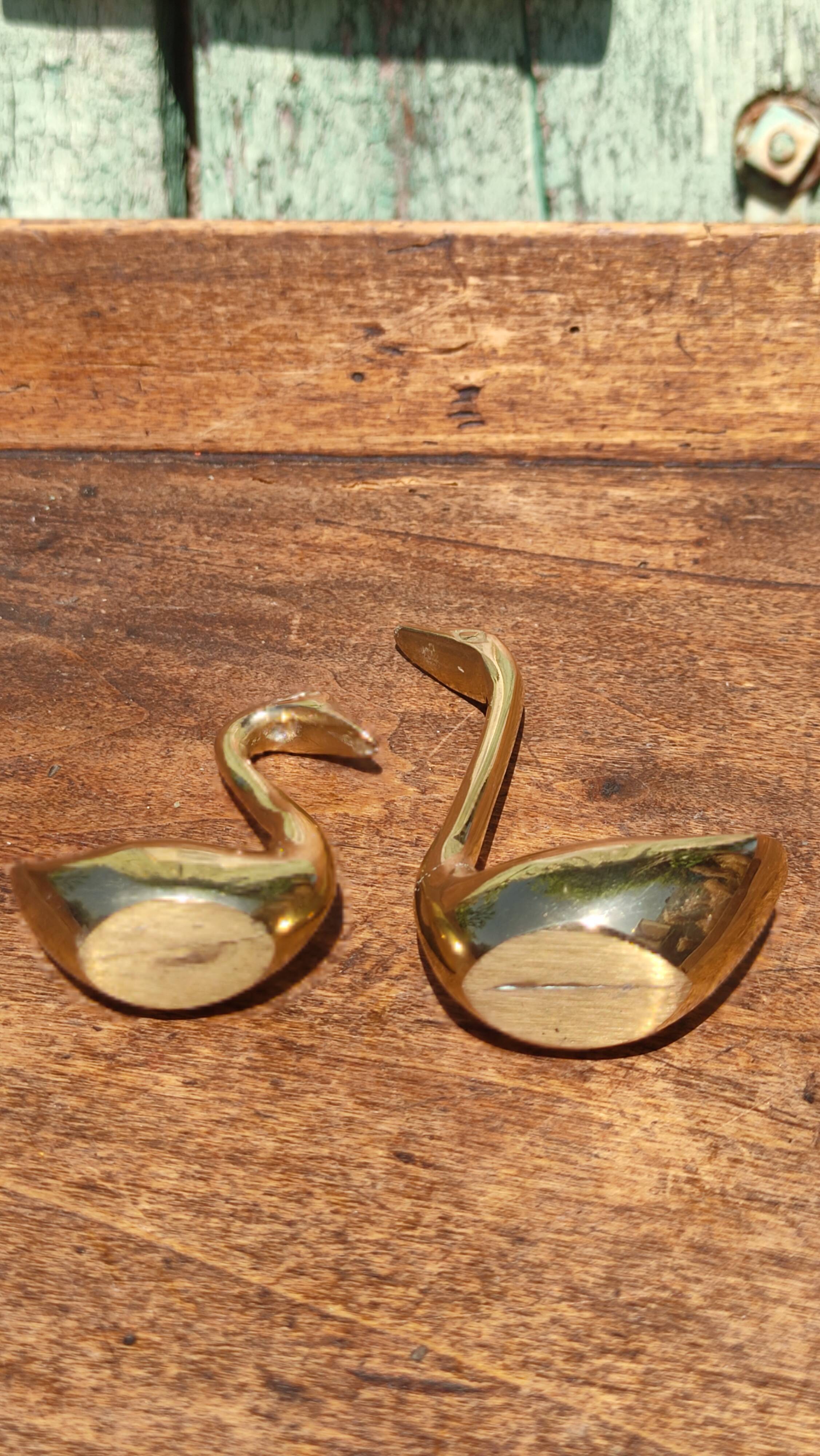 Pair of golden brass swans