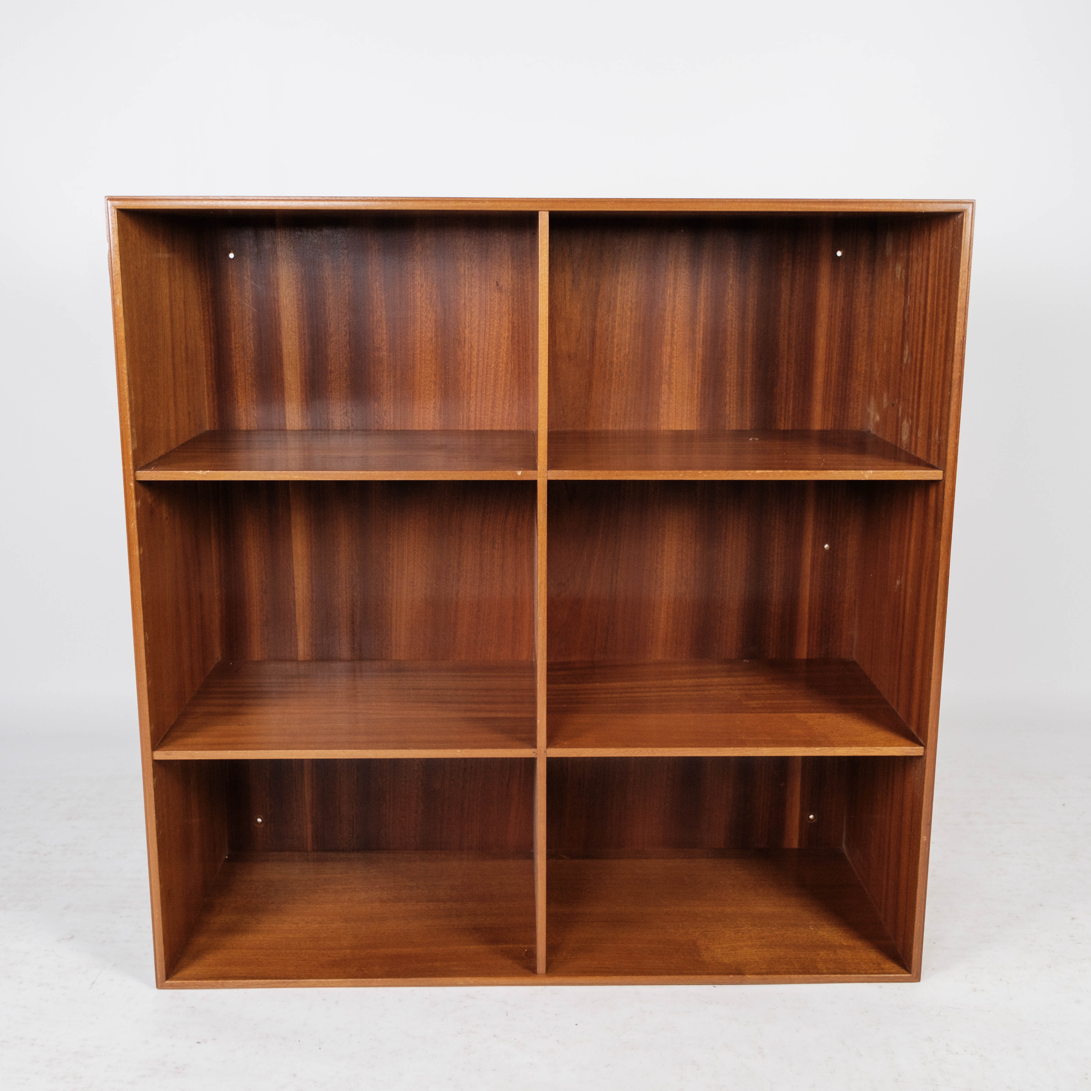 Bookcase in light mahogany designed by Mogens Koch and manufactured by Rud Rasmussen in the 1960s.