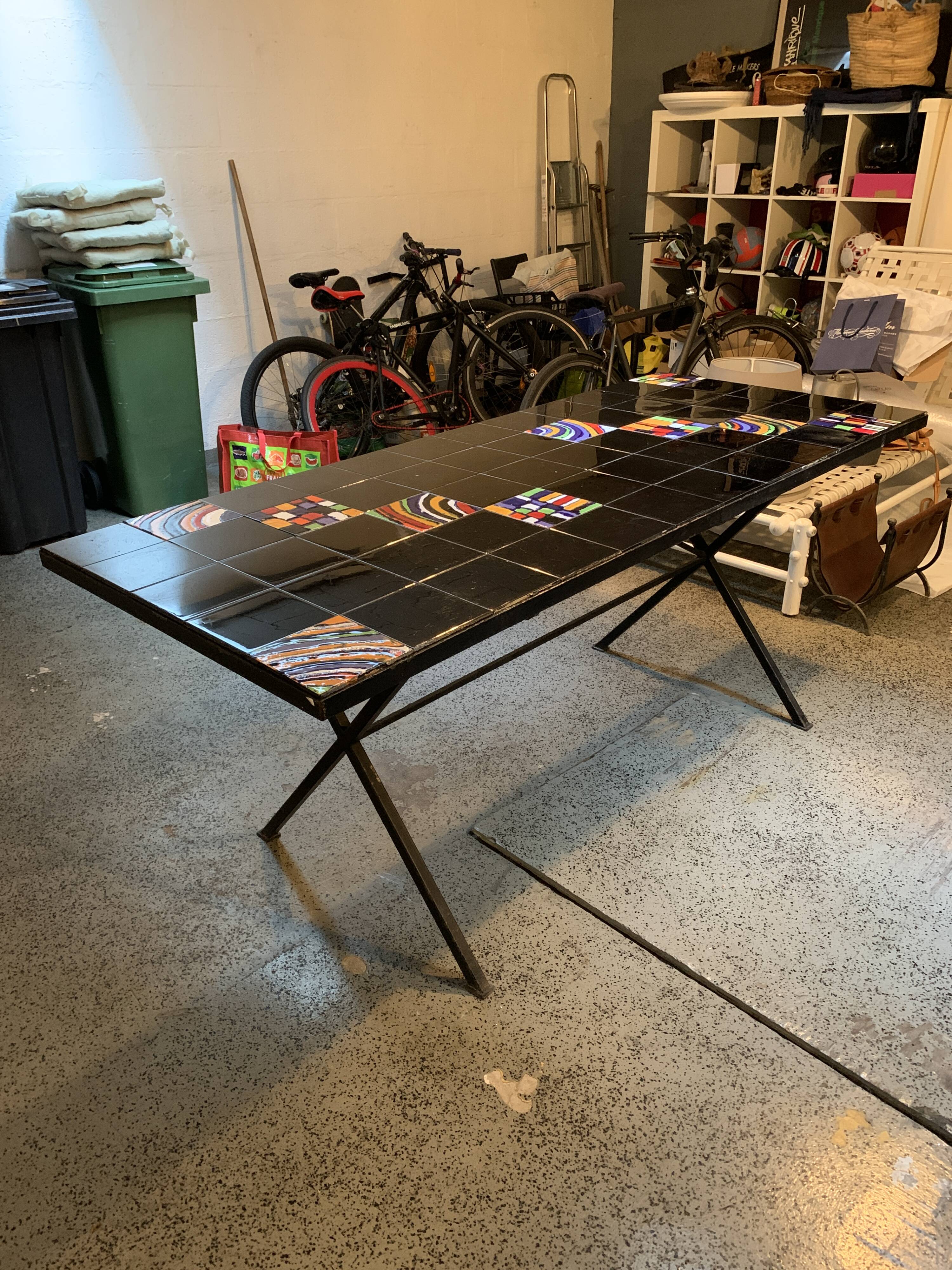 Dining table with metal base in X and painted ceramic tile cladding, 50s.