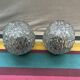 Old pair of glass moulded wall sconces with vintage black metal support