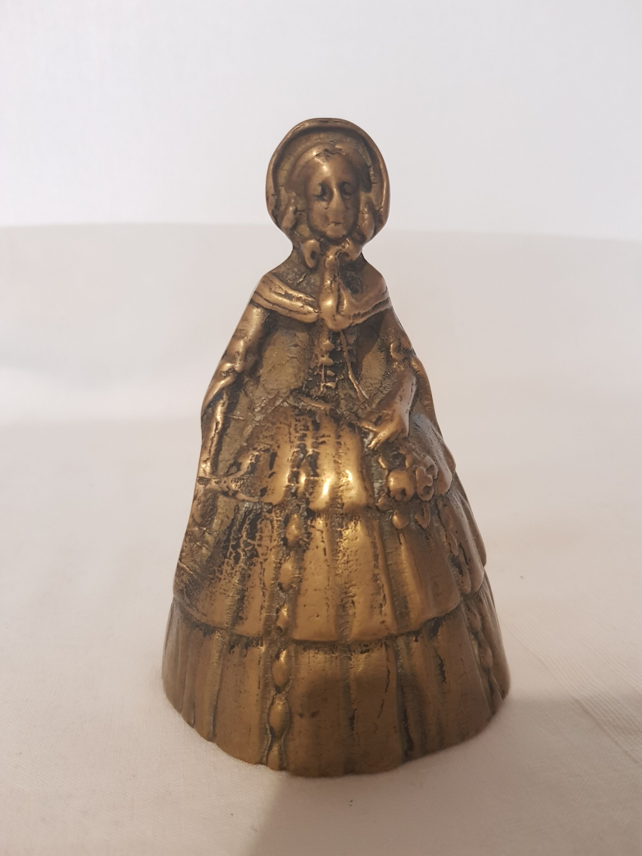 Women's bronze table bell