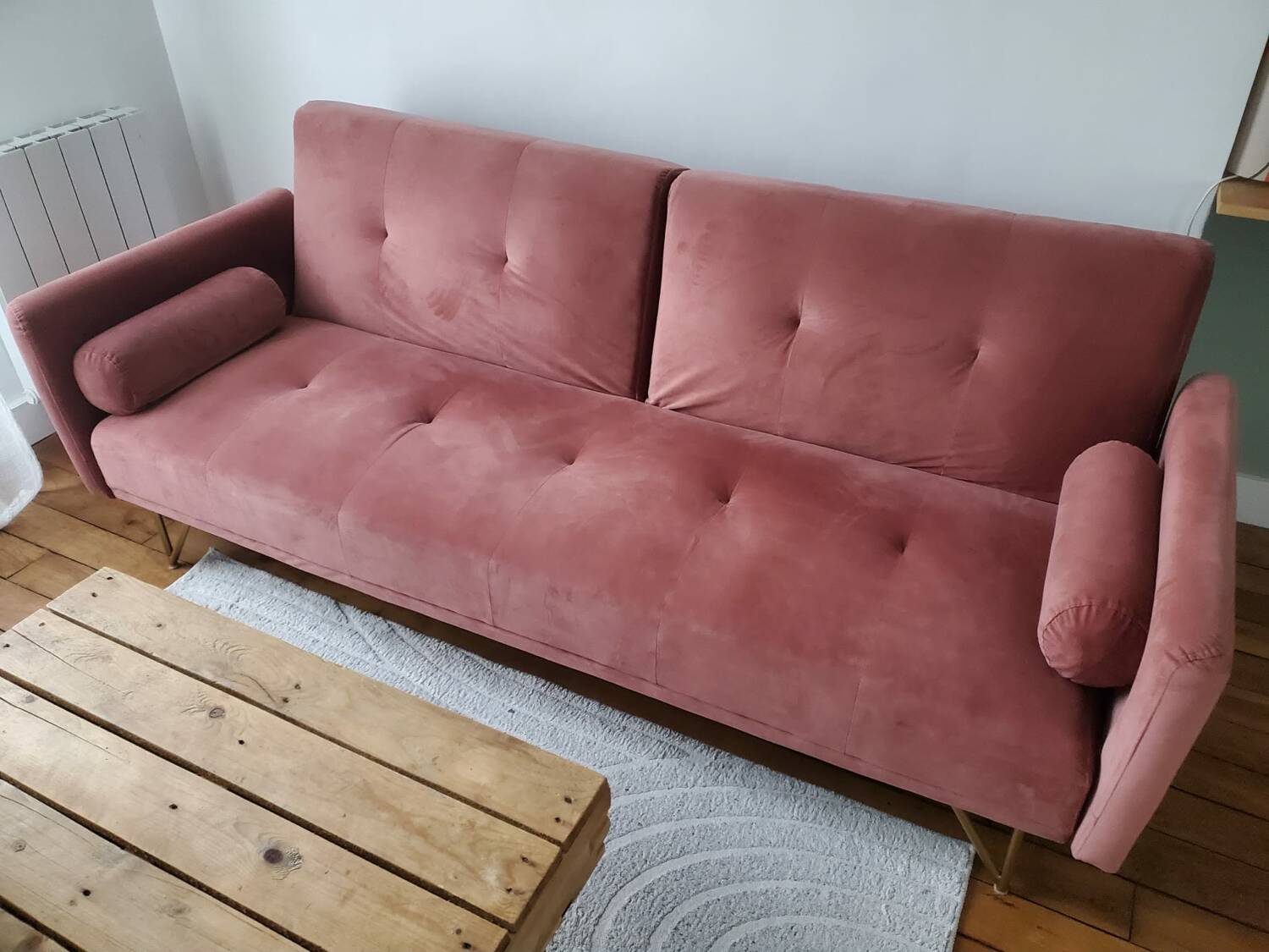 Powder pink convertible sofa