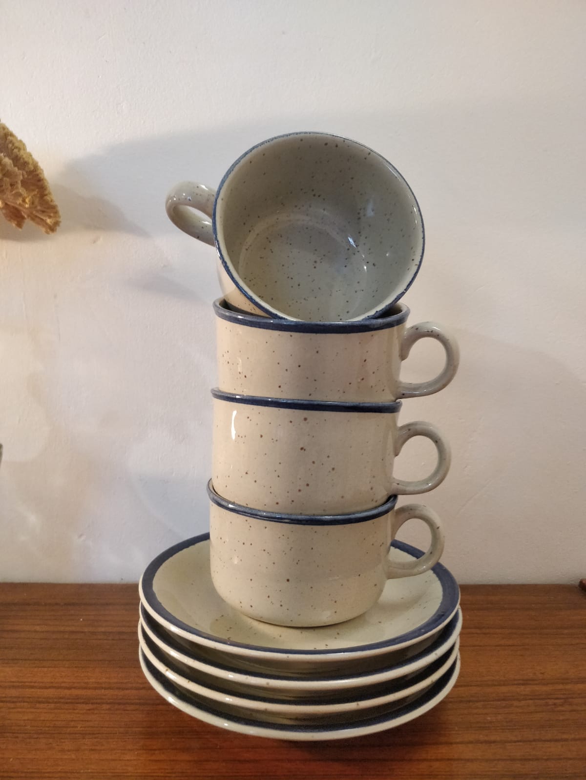 Four cups and their saucers