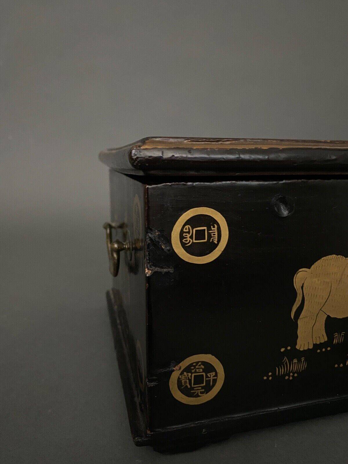20th century Indian wooden box black lacquer decorated with animals with gold highlights