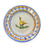 Earthenware plate representing a bird signed Lario