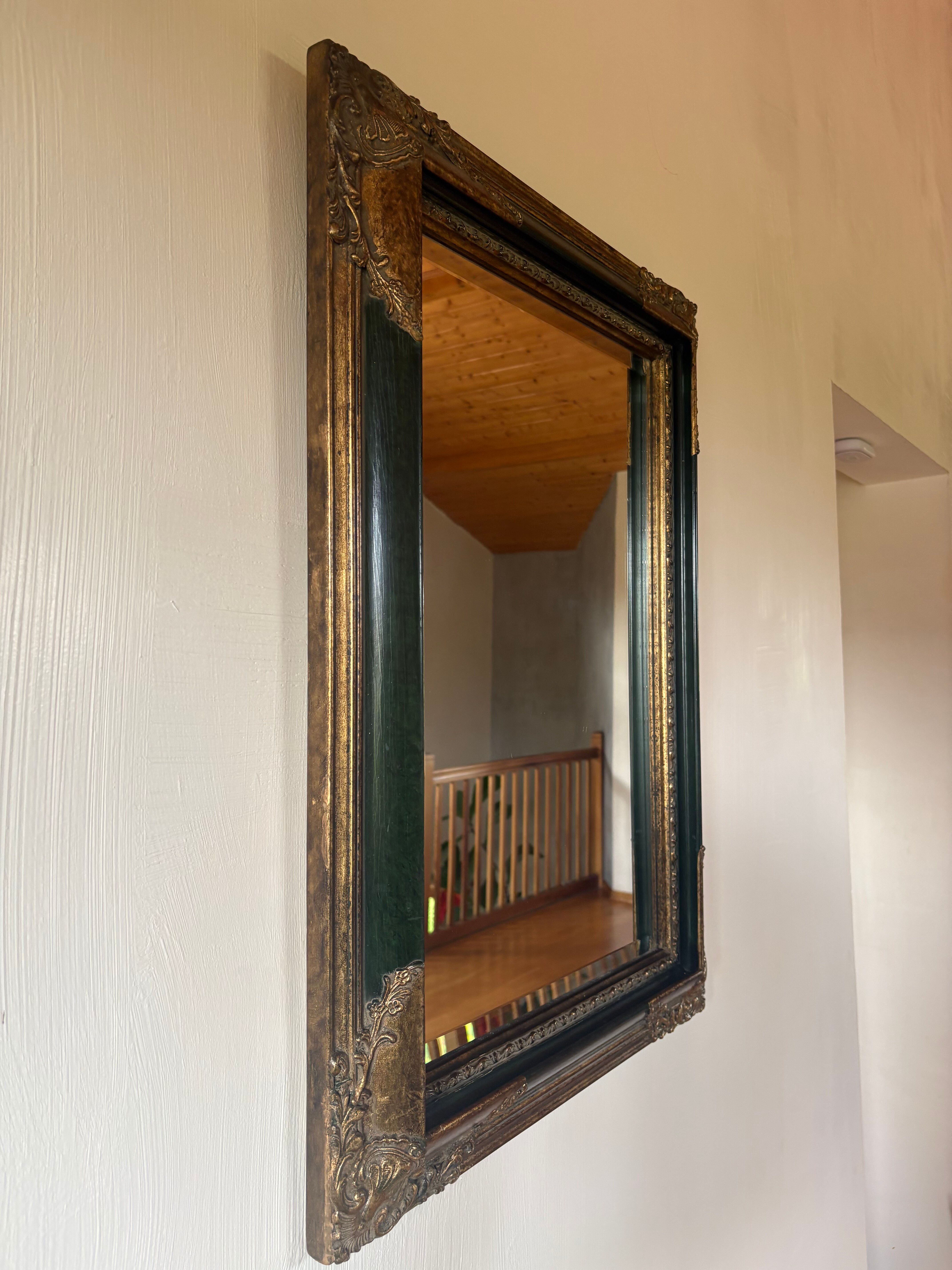 Miroir ancien style Napoléon III en bois noirci et doré – cadre d’orig