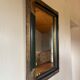 Miroir ancien style Napoléon III en bois noirci et doré – cadre d’orig