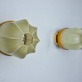 Pair of "cocoon" wall lights, resin and pine, Italy, 1970
