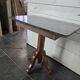 Old pedestal table with oak legs and marble top