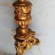 Wooden candlestick and gilded stucco from the beginning of the 20th century