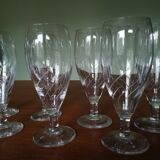 Eight champagne flutes in engraved glass