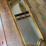 Large long mirror in gilded wood