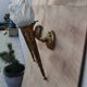 Paire d'appliques flambeau vintage en bronze