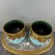 Paire de cache-pots en barbotine à décor de mascarons, XIXe siècle
