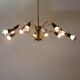 Italian Black and brass 12 arm Spider Chandelier  1950s