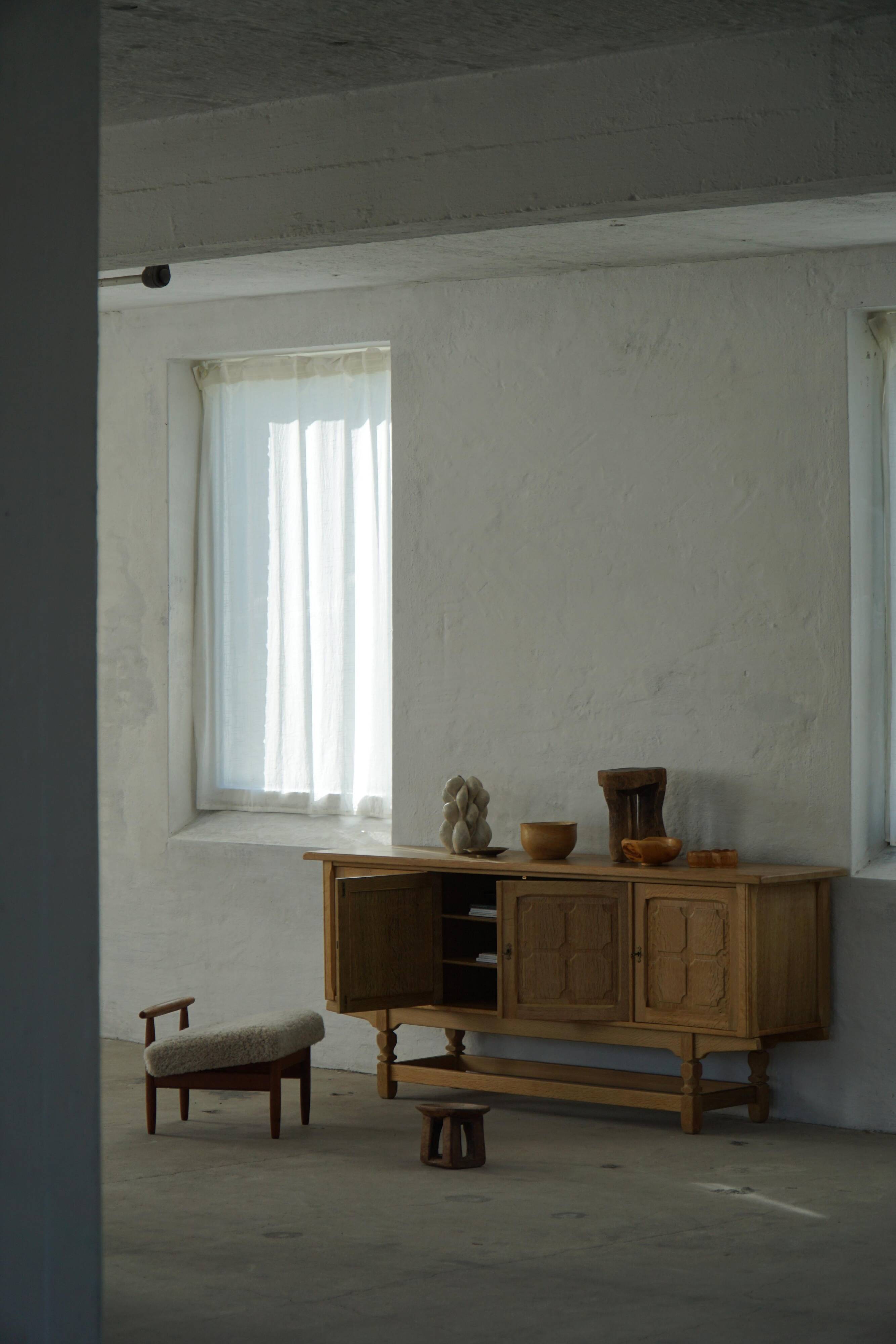 Eivind A. Johansen, oak footrest with light lambswool padding for FDB Møbler