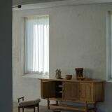 Eivind A. Johansen, oak footrest with light lambswool padding for FDB Møbler