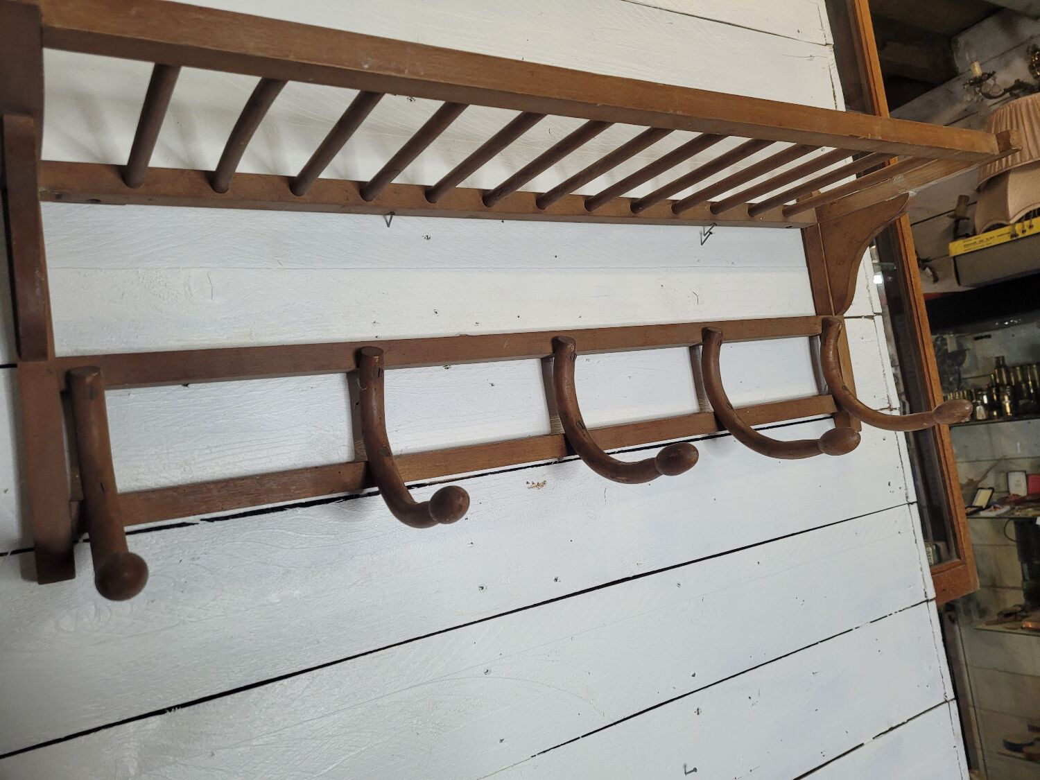 Curved wooden coat rack