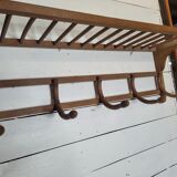 Curved wooden coat rack