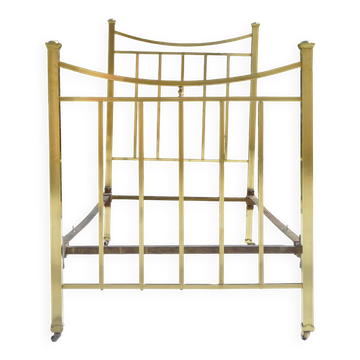 Antique single bed in gilded brass
