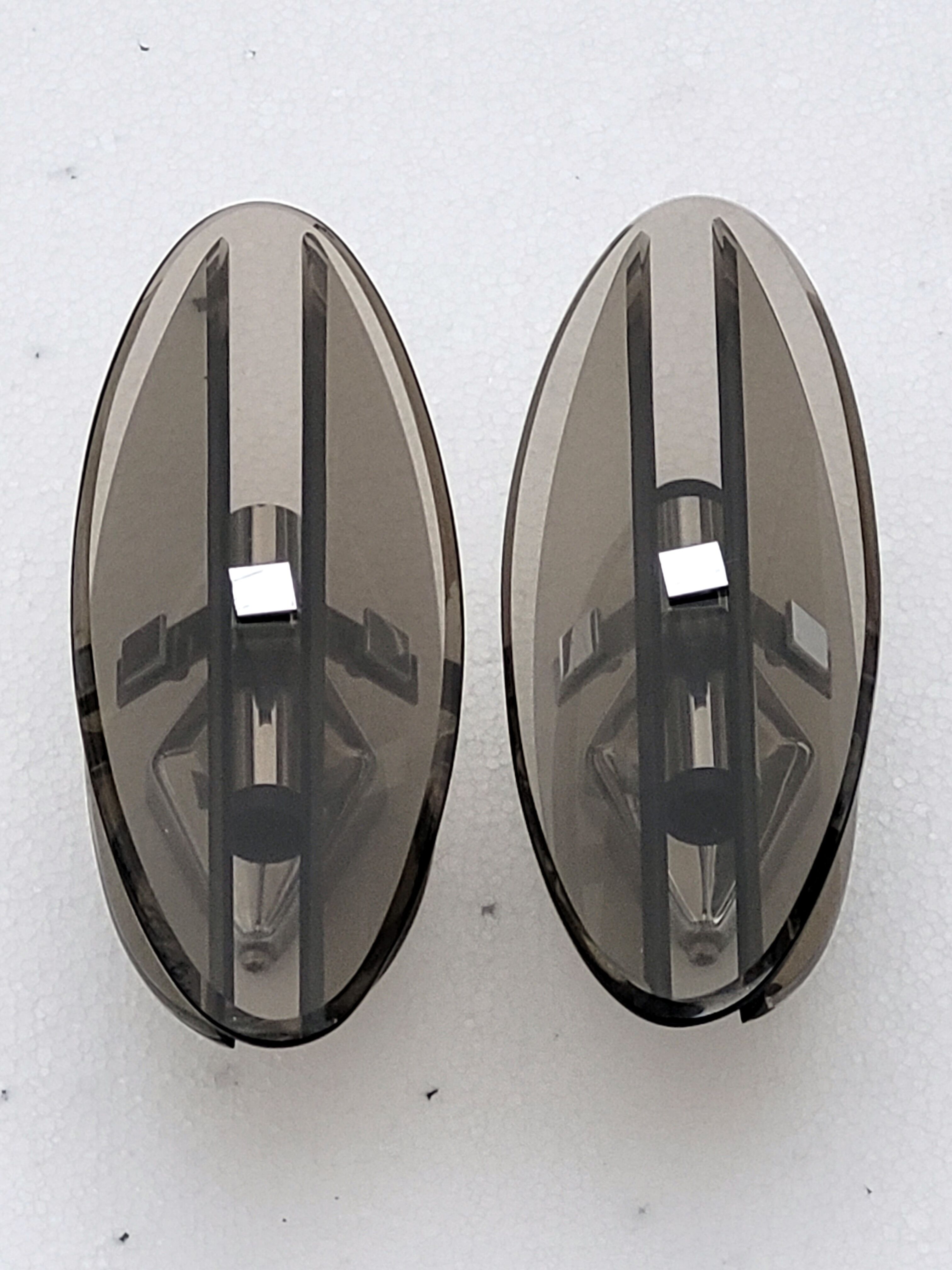 Pair of elliptical italian wall lamps in smoked glass and chrome veca