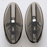 Pair of elliptical italian wall lamps in smoked glass and chrome veca